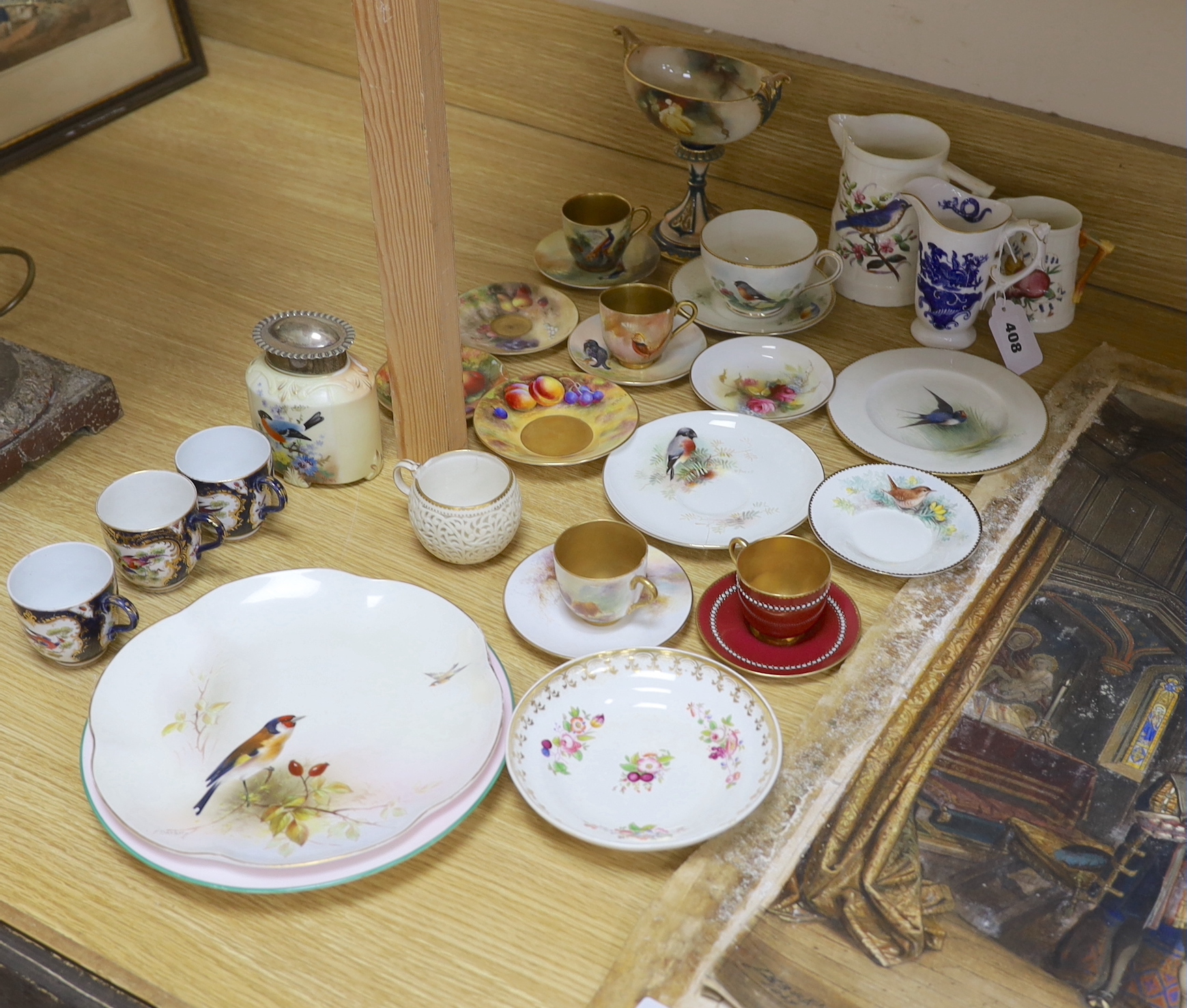 A large group of late 19th/early 20th century Royal Worcester tea wares, (some damage) including a signed bird painted pieces and signed fruit painted saucers